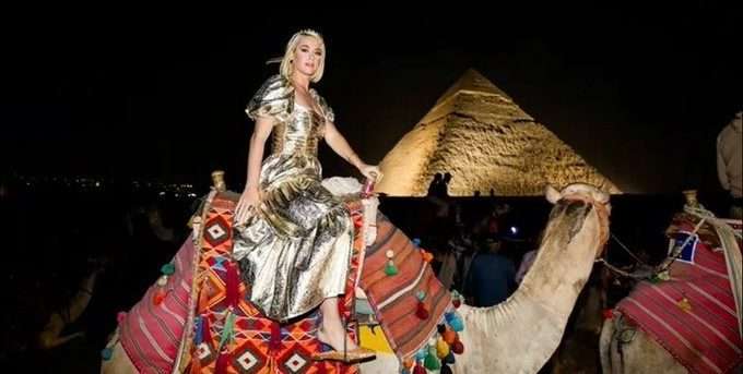 Katy Perry riding a camel in Egypt